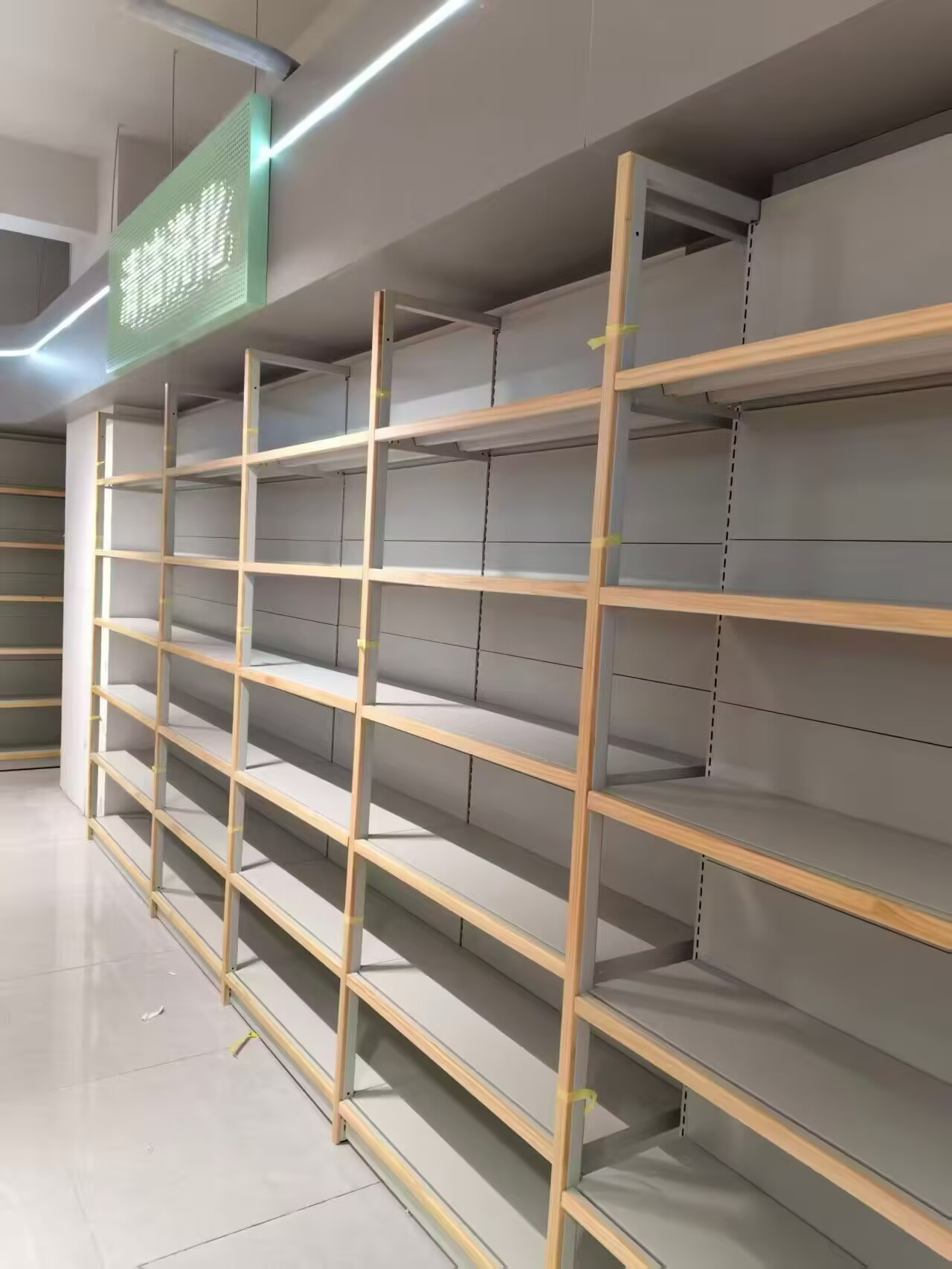 Four-Post Supermarket Shelves - Heavy-Duty Retail Display Racks Four-post supermarket display shelves, heavy-duty metal retail racks for grocery store merchandise display